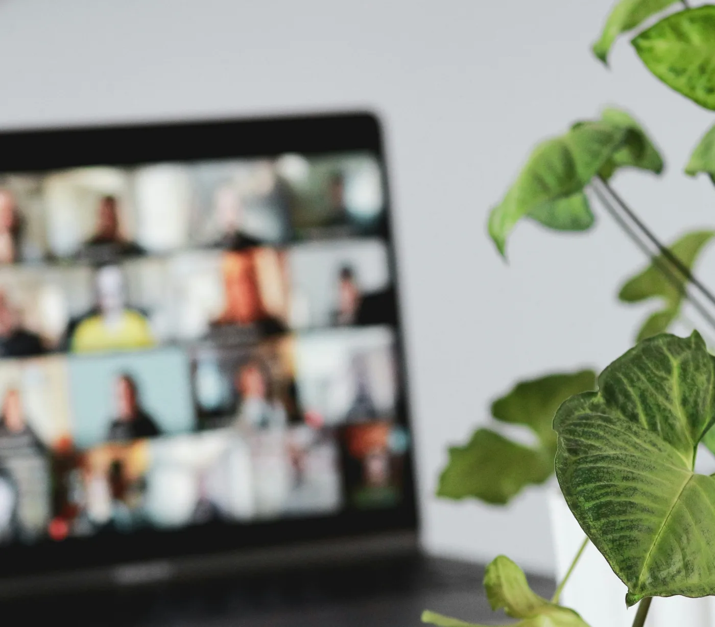 Laptop showing an online event with attendees joining over video